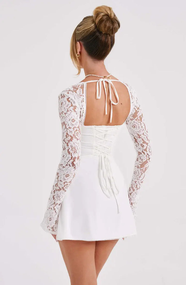 Trendy women's fit & flare mini dress with long lace sleeves, perfect for fashion-forward parties & events.
