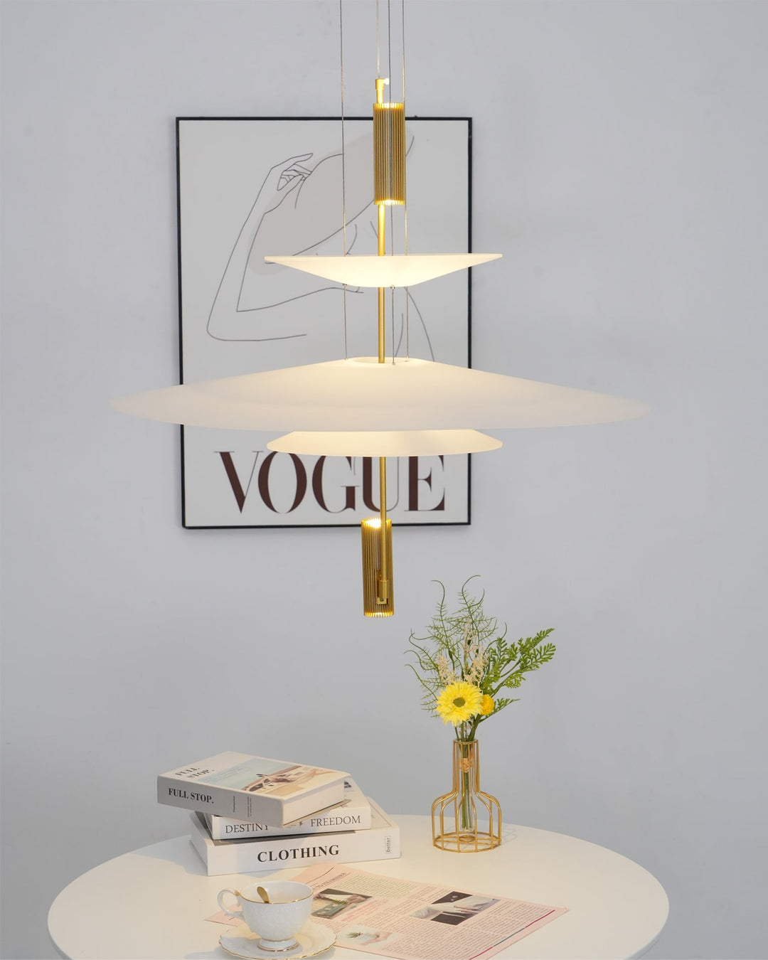 Modern floating disc pendant light, black integrated LED, stylish ceiling decor.