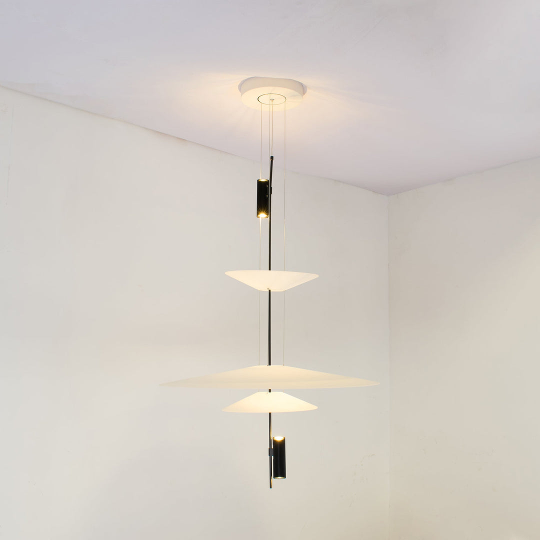 Contemporary disc pendant, integrated LED, black finish, minimalist home lighting.