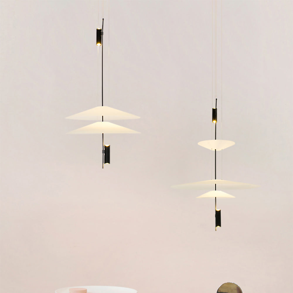 Sleek gold floating disc LED chandelier, modern design, bright home illumination.