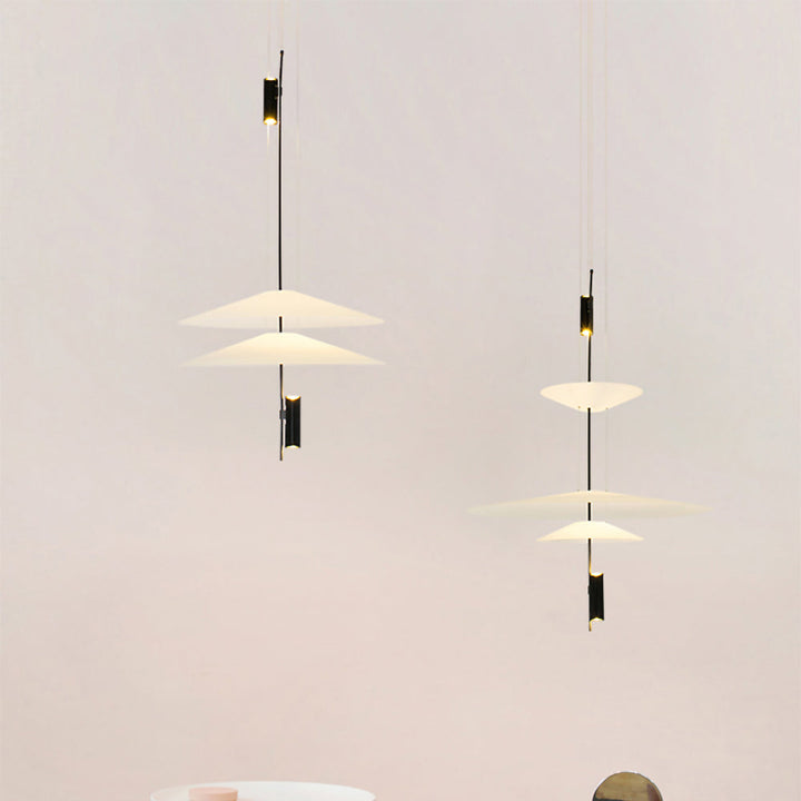 Sleek gold floating disc LED chandelier, modern design, bright home illumination.