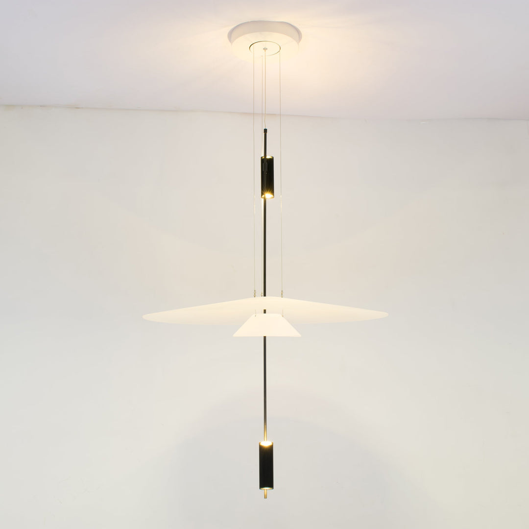 Modern integrated LED disc light, gold accent, ambient illumination for living spaces.