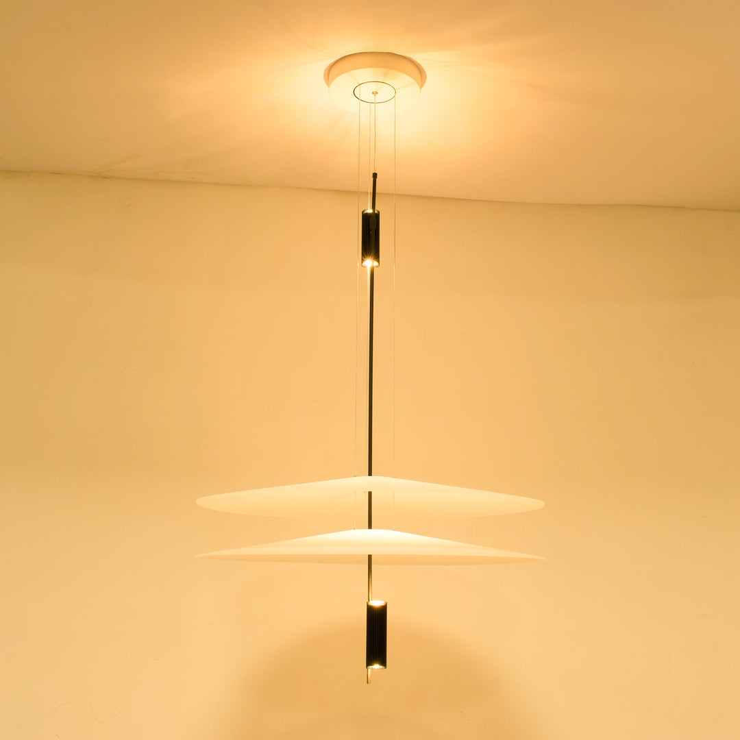 Gold floating disc LED hanging lamp, chic design, bright and warm ambient light.