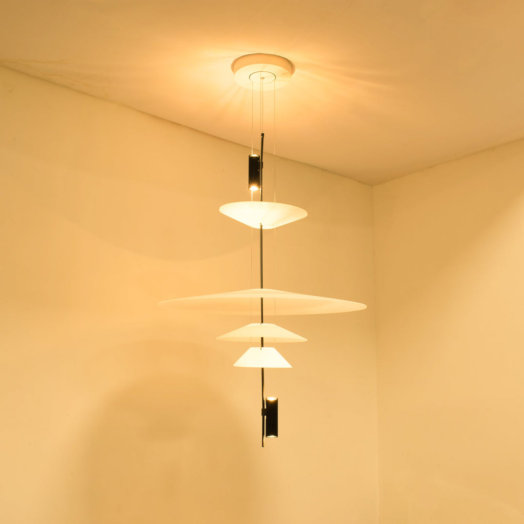 Sleek black floating disc pendant light, modern LED, contemporary decor accent.