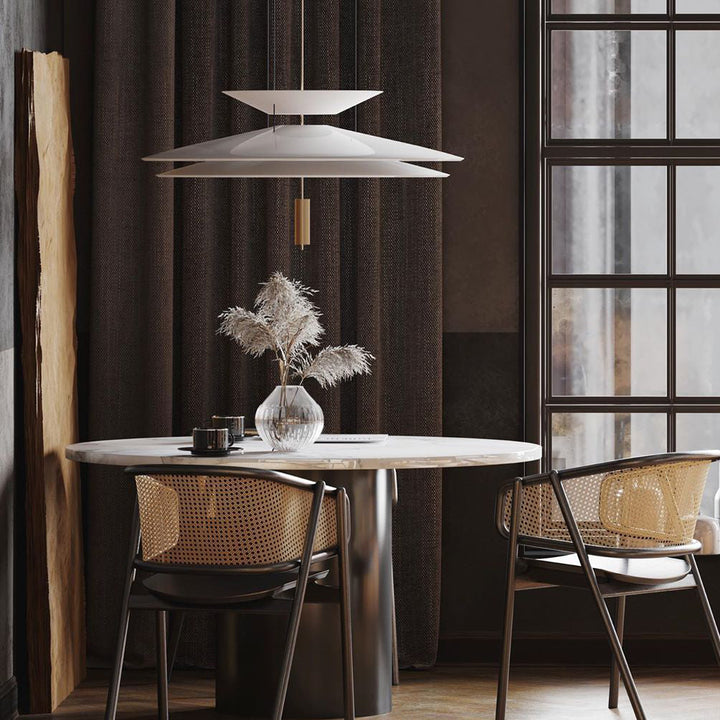 Modern integrated LED disc pendant light, sleek design for contemporary decor.