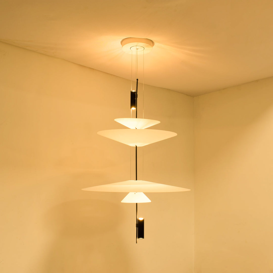 Chic floating disc LED chandelier, black finish, modern ceiling fixture for homes.