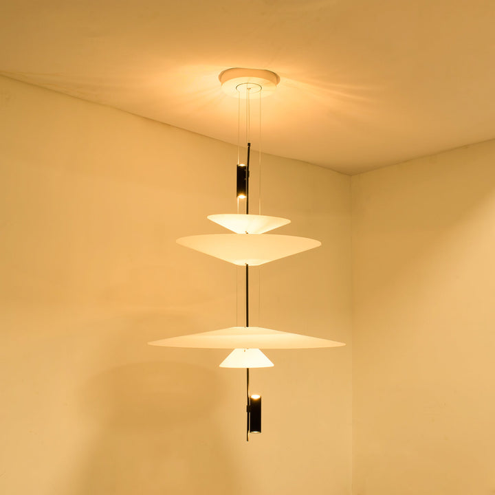 Chic floating disc LED chandelier, black finish, modern ceiling fixture for homes.