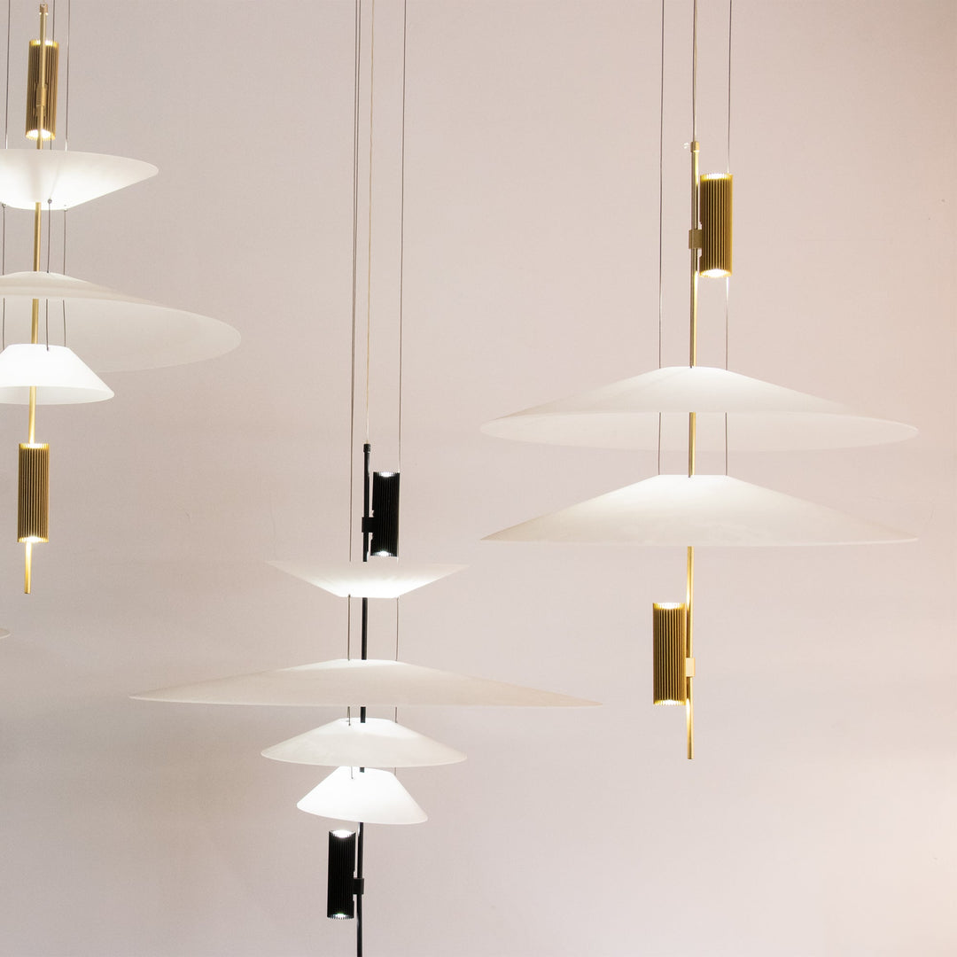 Modern integrated LED disc hanging lamp, gold finish, stylish home illumination.