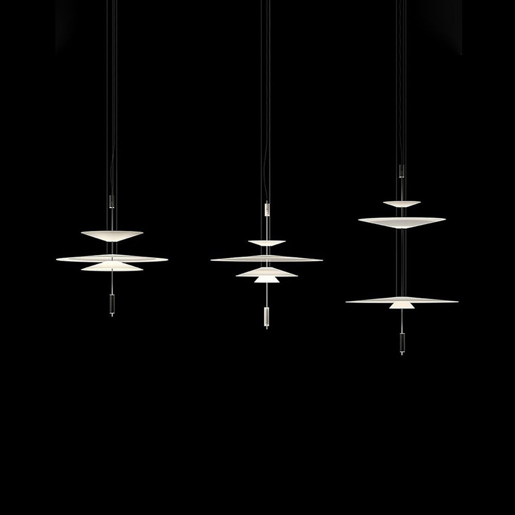 Elegant black disc light, integrated LED, contemporary hanging lamp design.