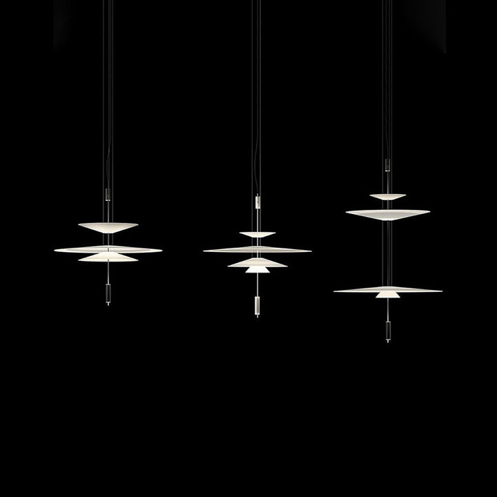 Elegant black disc light, integrated LED, contemporary hanging lamp design.