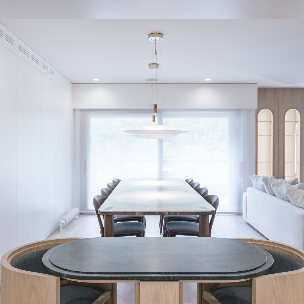 Gold floating disc LED chandelier, integrated for contemporary decor.