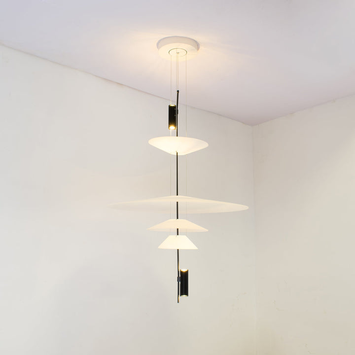 Chic floating disc pendant light, integrated LED, gold accent, bright home lighting.