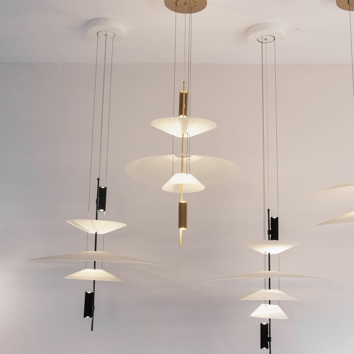 Contemporary disc ceiling fixture, integrated LED, black finish, ambient illumination.