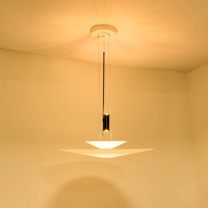 Sleek floating disc pendant, modern LED light, gold tone, stylish home decor.