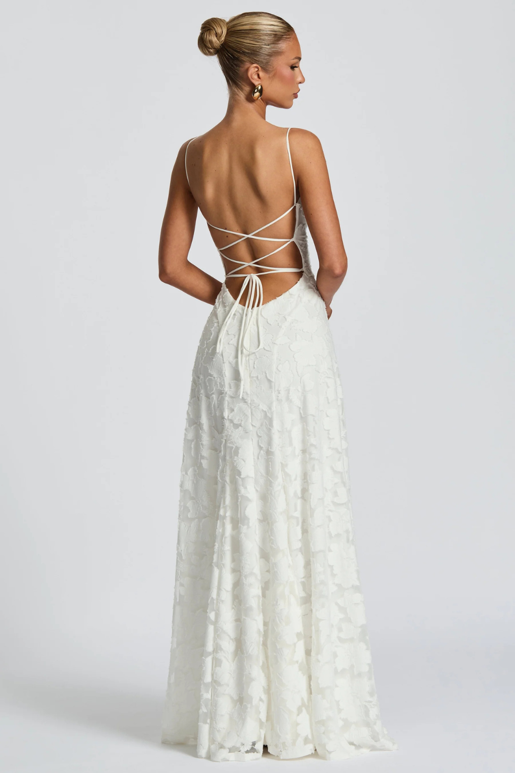 Stunning women's floral brocade maxi dress, the ultimate elegant wedding guest attire.