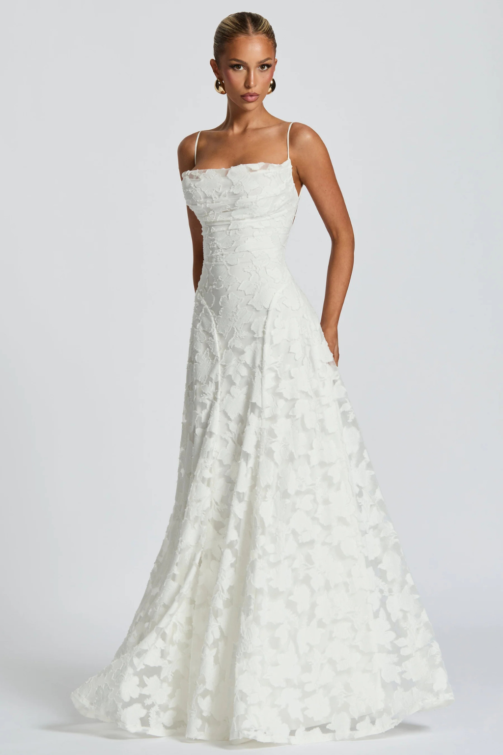 Intricate floral brocade maxi dress, a sophisticated long formal evening gown for women.