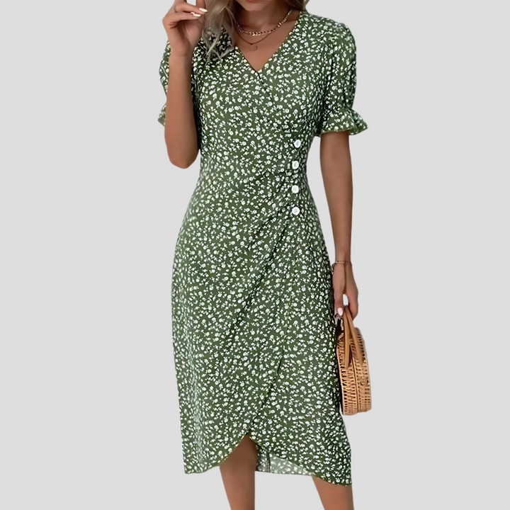 Casual yet elegant floral midi dress, designed for a feminine silhouette.