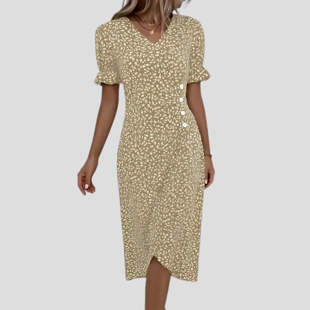 Flattering V-neck summer dress with short puff sleeves and a floral pattern.
