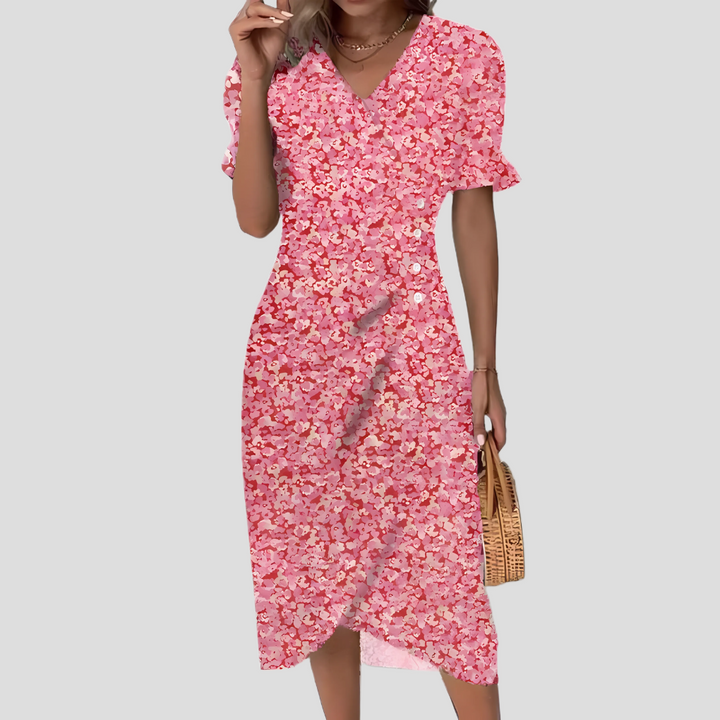 Versatile floral midi dress with V-neck and on-trend puff sleeves.