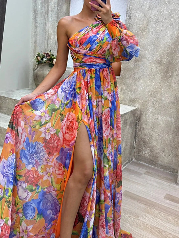 Stylish floral one-shoulder maxi dress for women with high slit. Versatile for elegant parties & summer wear.