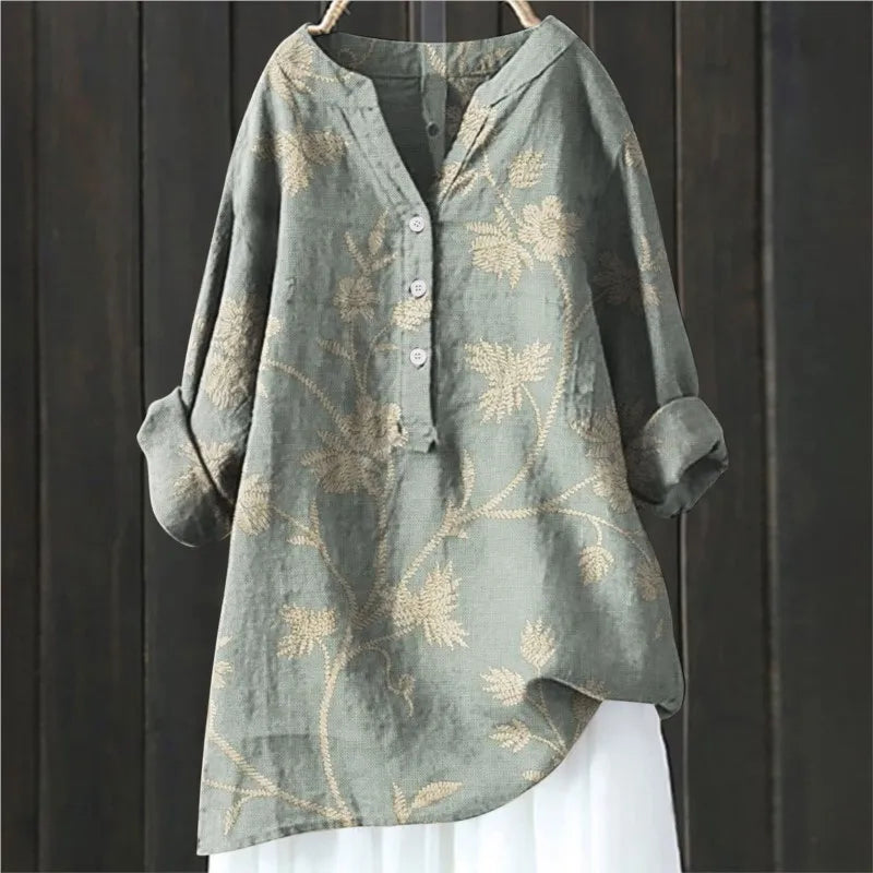 Women's casual V-neck floral print long-sleeve blouse for elegant spring and summer fashion.