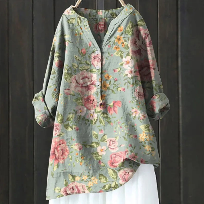 Stylish floral print long-sleeve women's blouse. Elegant casual top for spring and summer fashion.