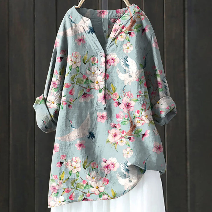 Everyday elegant floral print women's blouse. Comfortable V-neck long-sleeve top for casual spring/summer style.