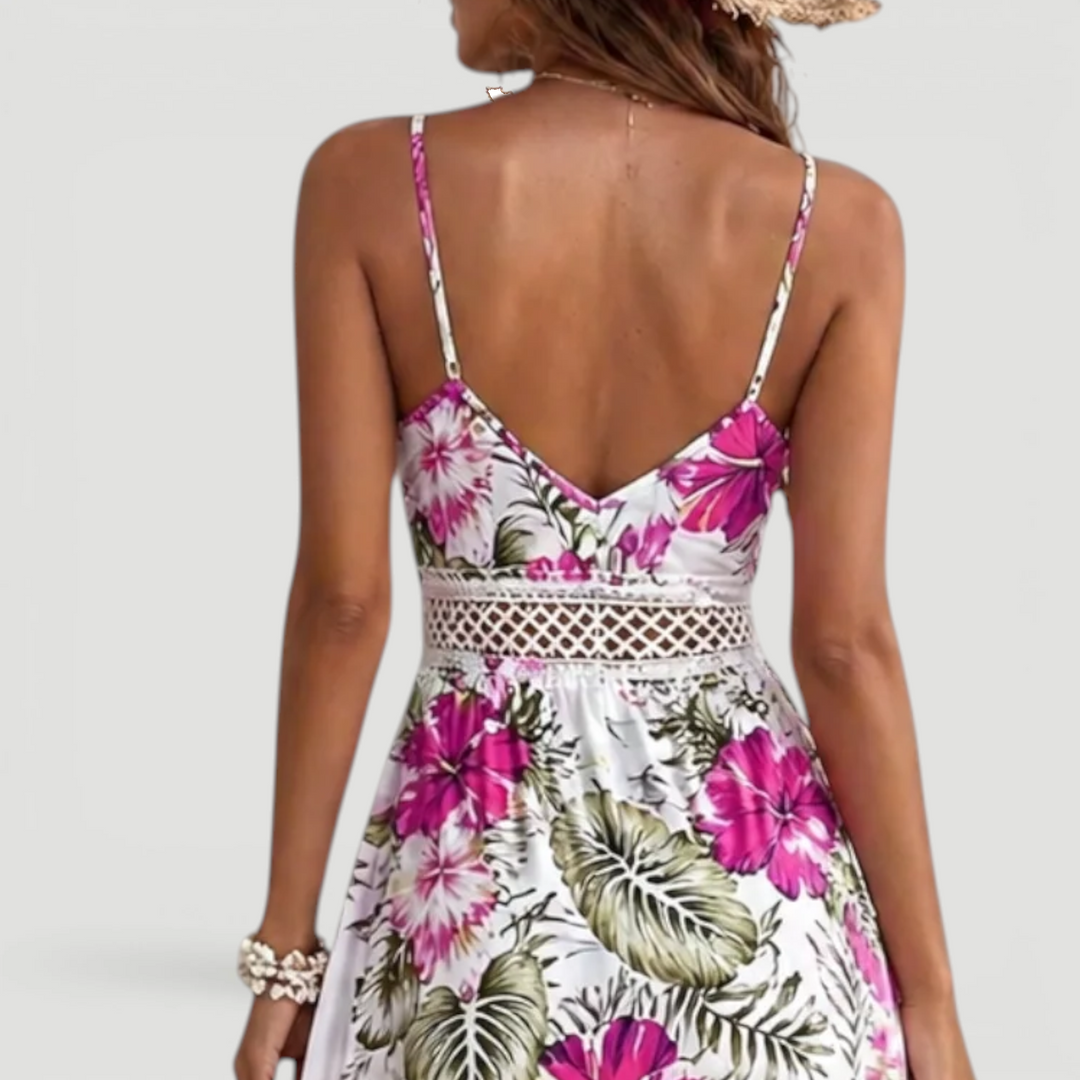 Stylish women's sleeveless maxi dress with vibrant floral print, ideal for elegant summer events.