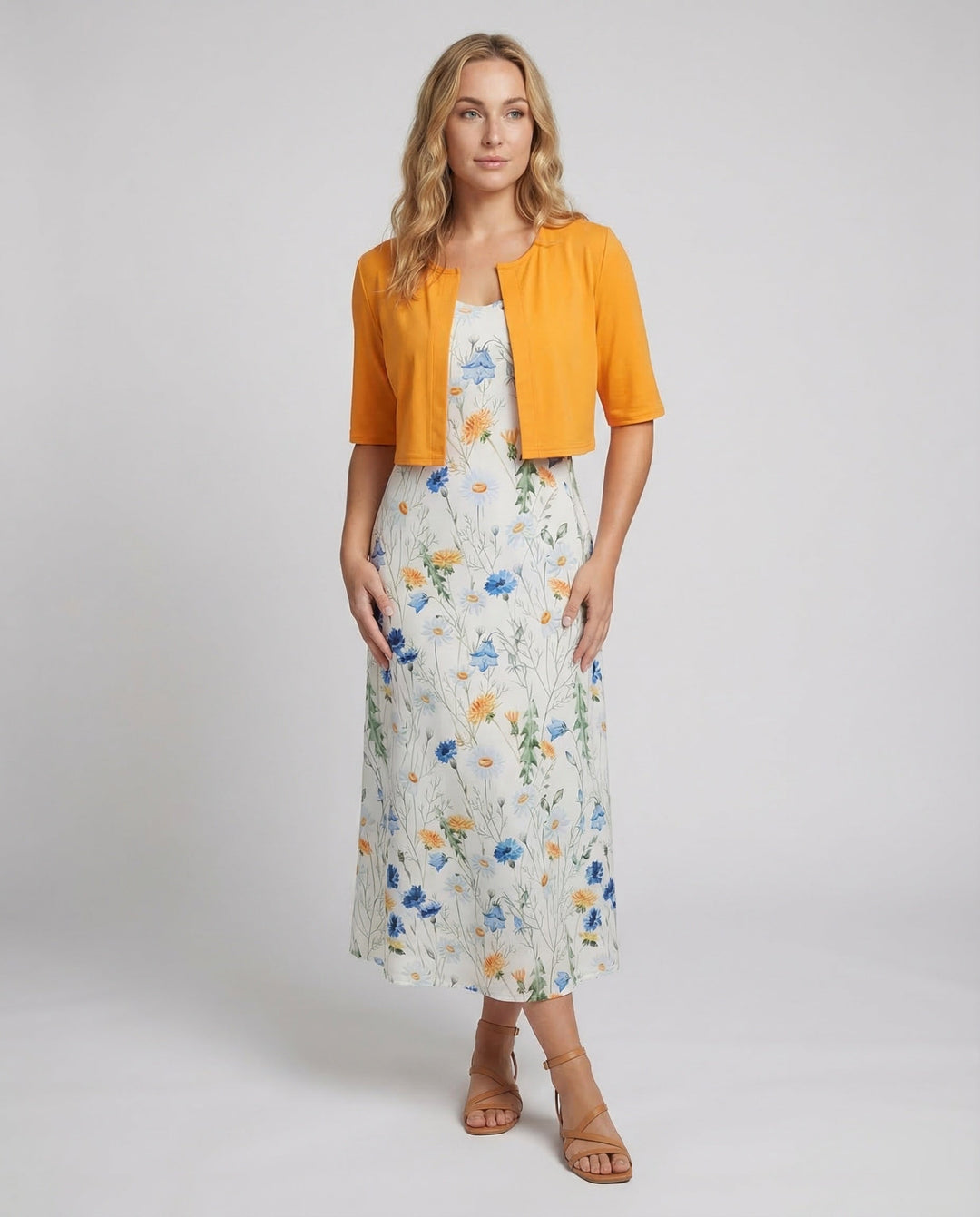 Elegant floral two-piece dress set for women with chic crop top and skirt.