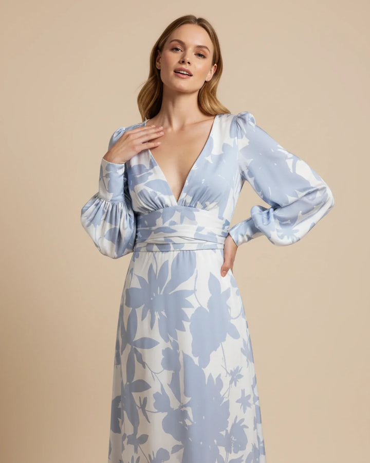 Women's elegant floral maxi dress featuring a flattering V-neck and stylish bishop sleeves.