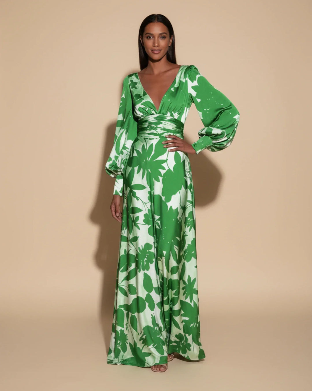 Feminine floral print maxi dress with V-neck, long bishop sleeves, ideal for summer weddings.