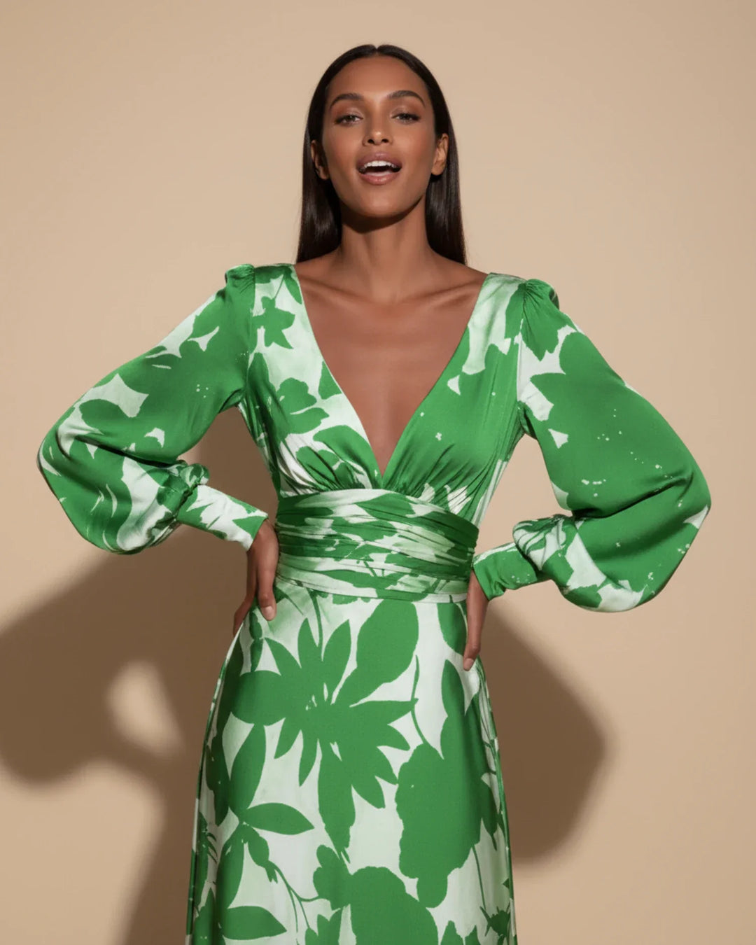 Chic floral V-neck wrap maxi dress with elegant bishop sleeves, a sophisticated wedding guest outfit.