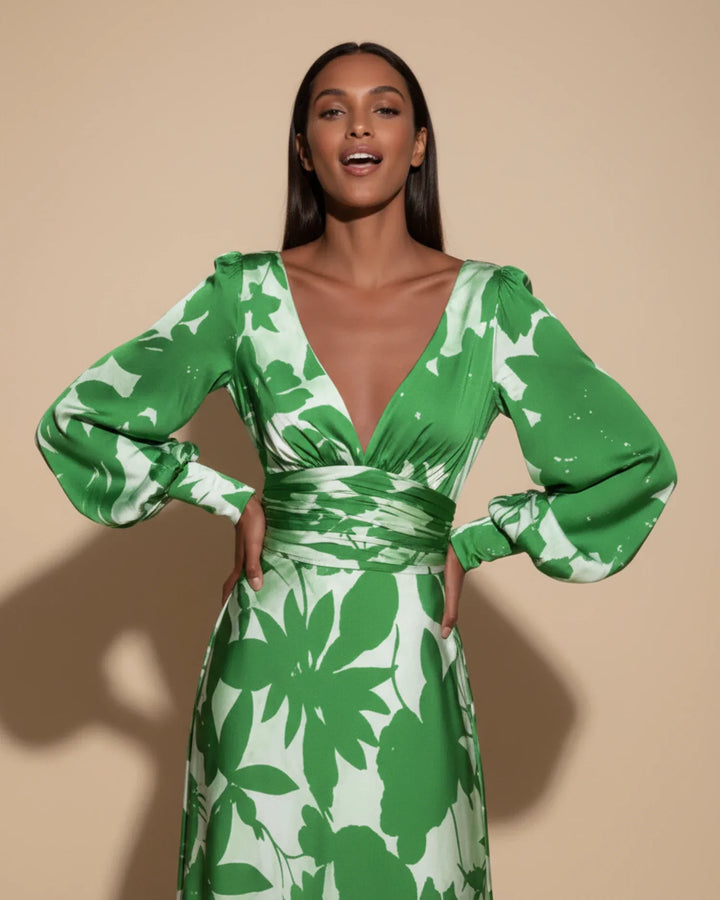 Chic floral V-neck wrap maxi dress with elegant bishop sleeves, a sophisticated wedding guest outfit.
