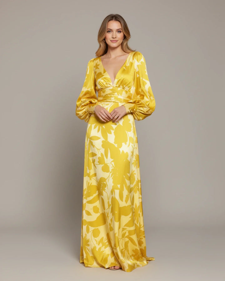 Flattering V-neck floral print maxi dress with elegant bishop sleeves, perfect for formal events.