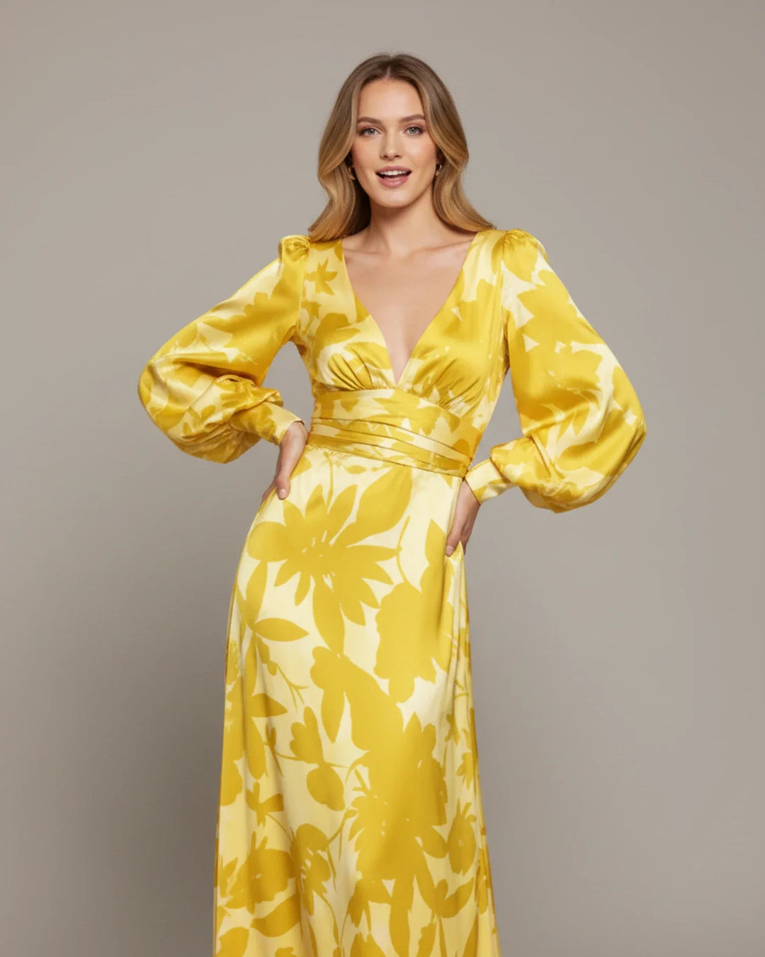 Women's elegant floral V-neck maxi dress with stylish bishop sleeves, a charming wedding guest attire.