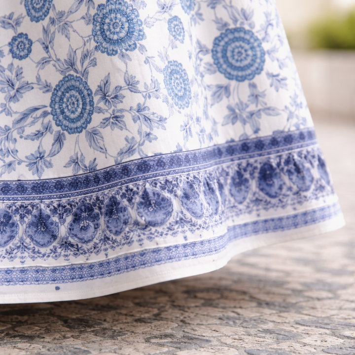 Women's elegant floral V-neck maxi dress with a flowing design, perfect for effortless summer style & comfort.