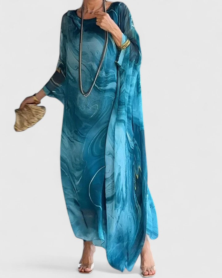 Elegant flowy maxi dress for women, perfect for special occasions like weddings or parties.