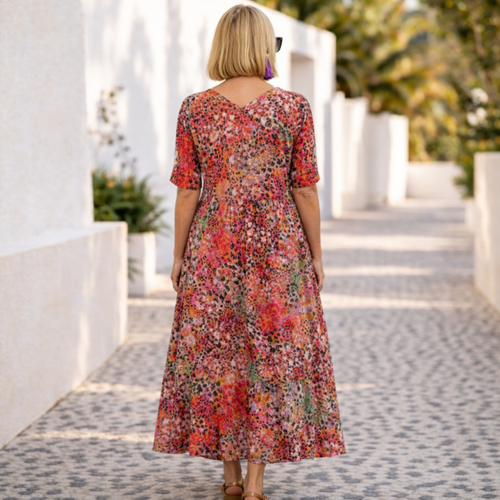 Flattering women's flowy midi dress, comfortable for casual or occasion wear. Stylish & versatile, available in plus sizes.