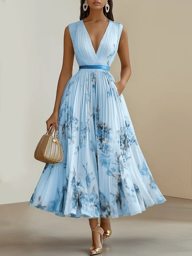 Stylishly elegant women's V-neck maxi dress. Flowy silhouette, comfortable for any summer or evening event.