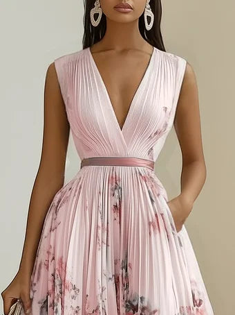 Feminine & comfortable flowy V-neck maxi dress for women. Sleeveless design, ideal for summer.