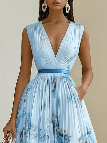 Chic women's summer maxi dress with V-neck and flowy silhouette. Comfortable & elegant for warm weather.