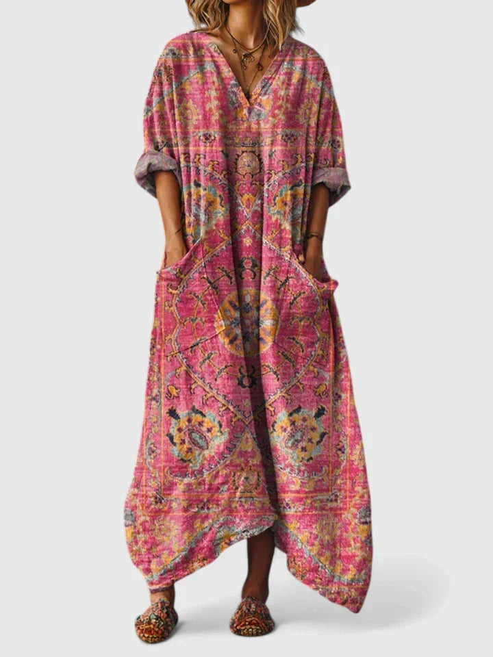 Beautiful women's elegant flowy dress with a unique print, V-neck, and practical pockets for effortless style.