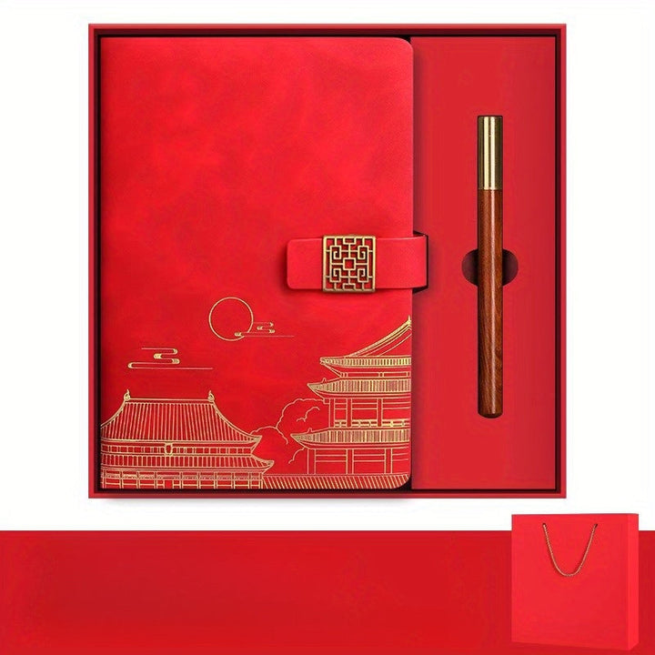 Set of office supplies: Forbidden City notebook, thermos bottle, and pen.