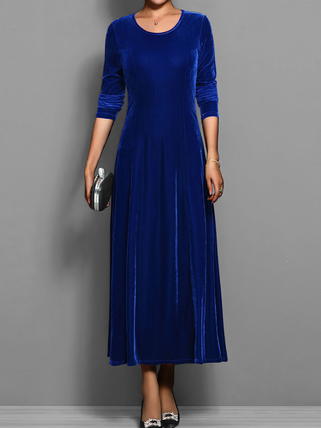 Elegant full-length women's flared maxi dress with long sleeves, round neck. Versatile evening/day wear.