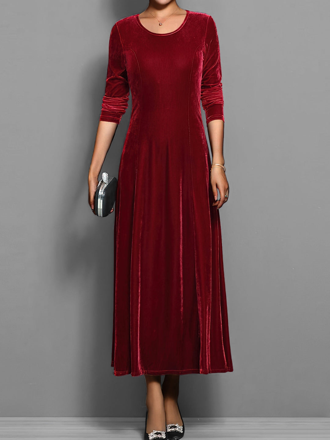 Stylish full-length flared maxi dress for women, features long sleeves & round neck. Elegant & modest fashion.