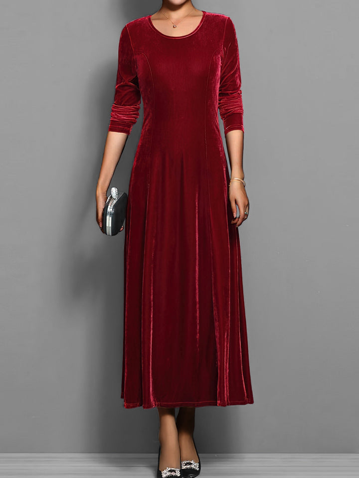 Stylish full-length flared maxi dress for women, features long sleeves & round neck. Elegant & modest fashion.