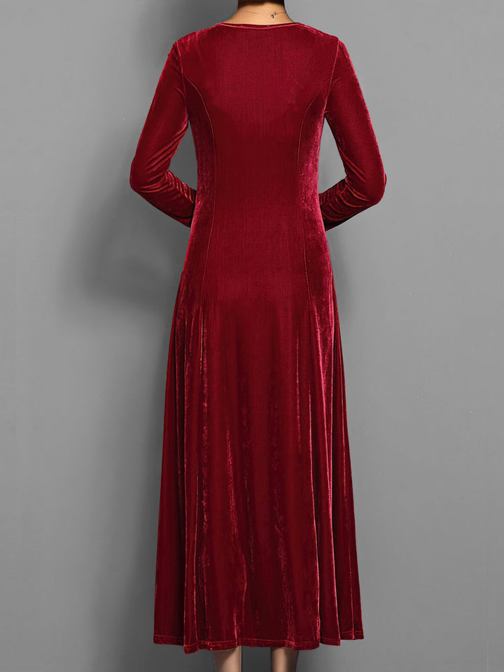 Women's elegant long-sleeve flared maxi dress, full-length. Perfect fall/winter dress for day or evening.