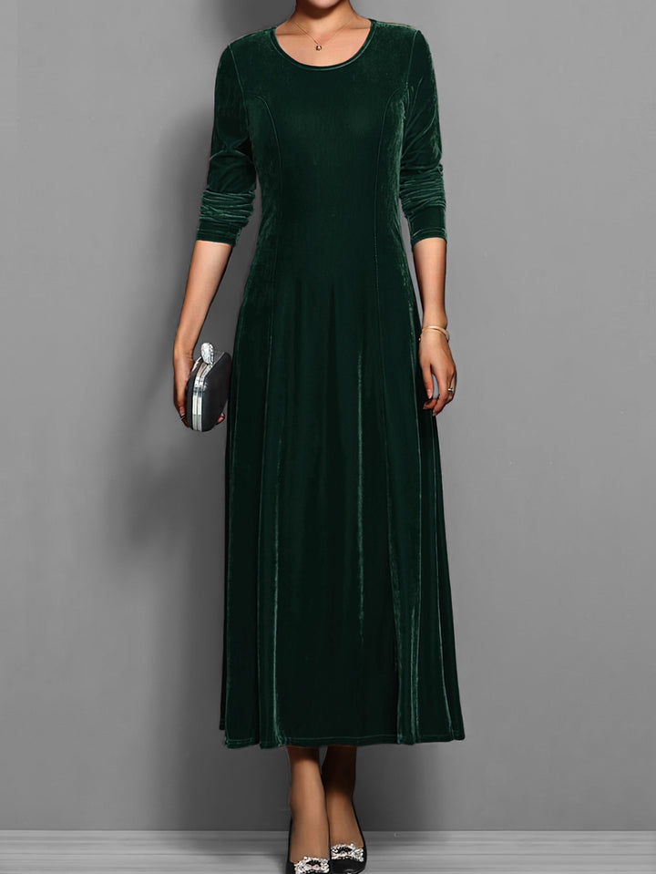 Modest & fashionable women's full-length flared maxi dress, long sleeves, round neck. Elegant versatile style.