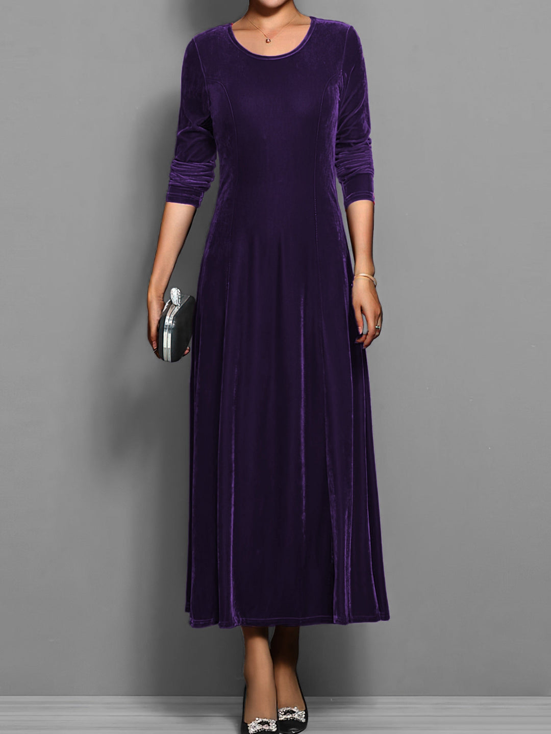 Elegant women's flared maxi dress, full-length, long sleeves, round neck. Perfect for evening or day events.