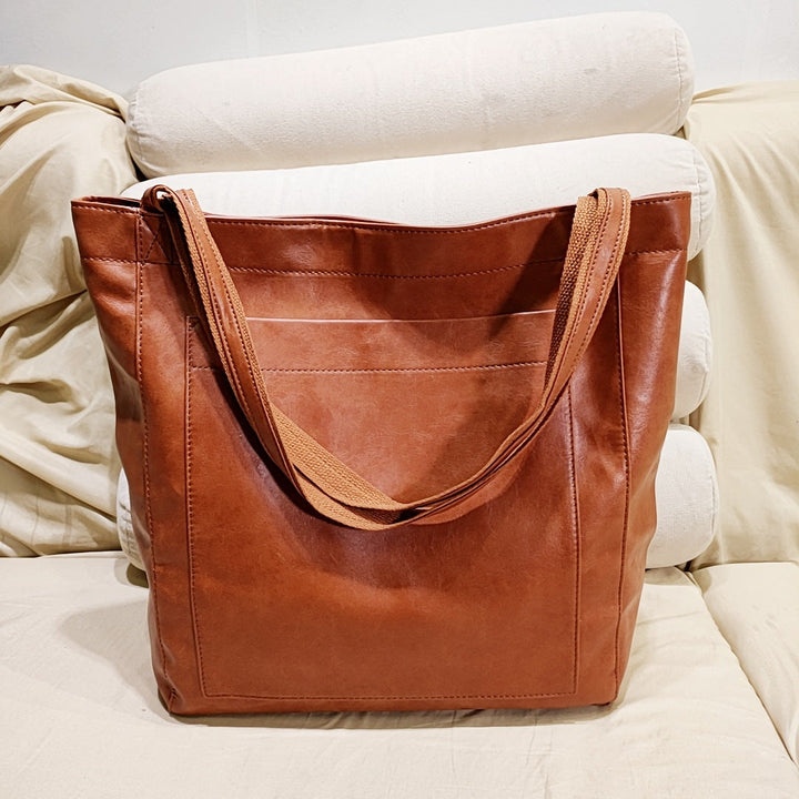 Elegant genuine leather handbag for women, a stylish crossbody or shoulder bag, perfect for daily wear & work.